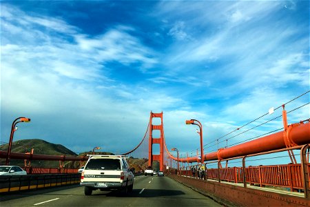 Cars Driving on Golden Gate Bridge photo