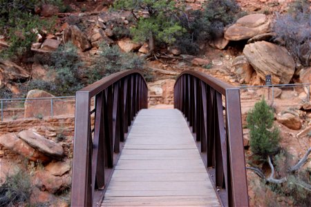 Walking Bridge by Rocks photo