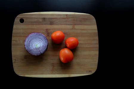 Tomatoes & Onion on Cutting Board photo