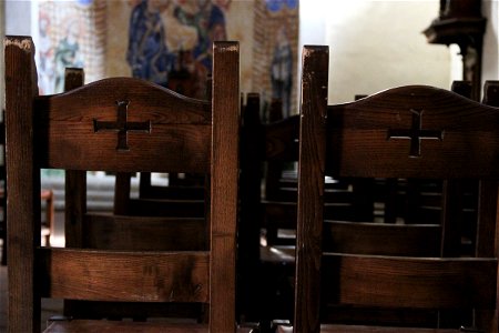 Rows of Wooden Chairs in Church photo