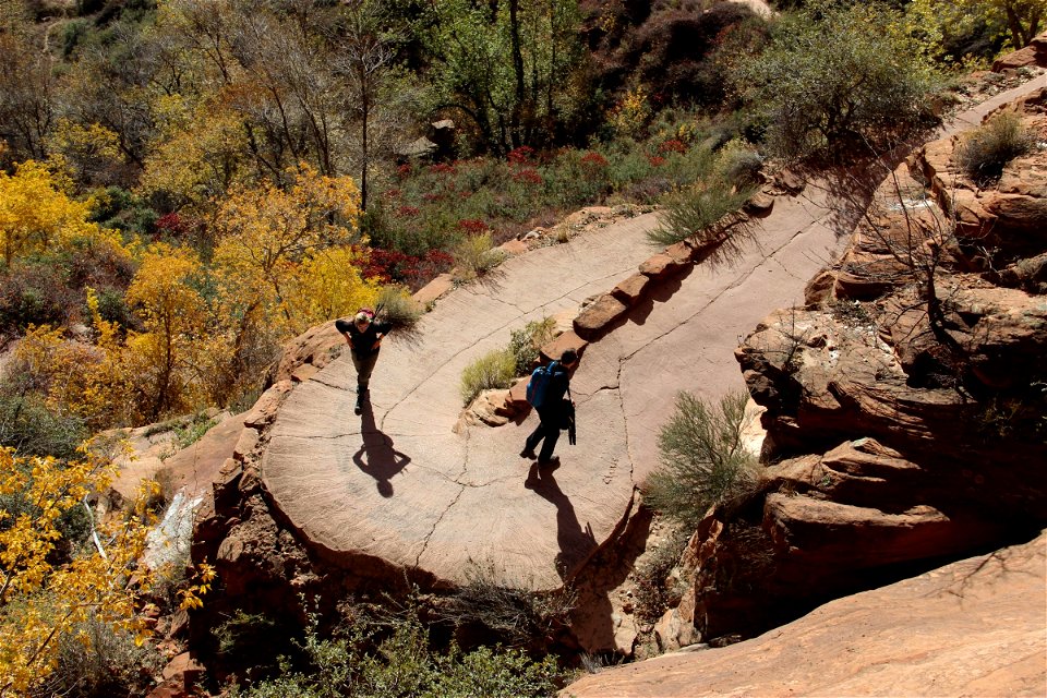 Man & Woman Walking Hiking Trail photo