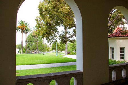 Arch Looking Out at Lawn with Trees