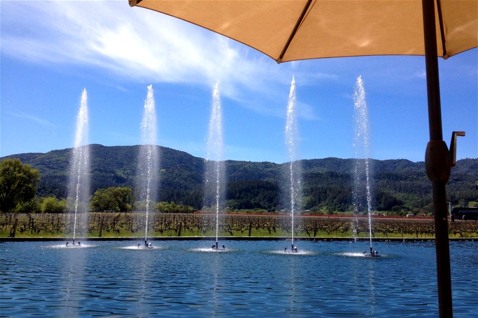 Water Fountains in Front of Mountains photo