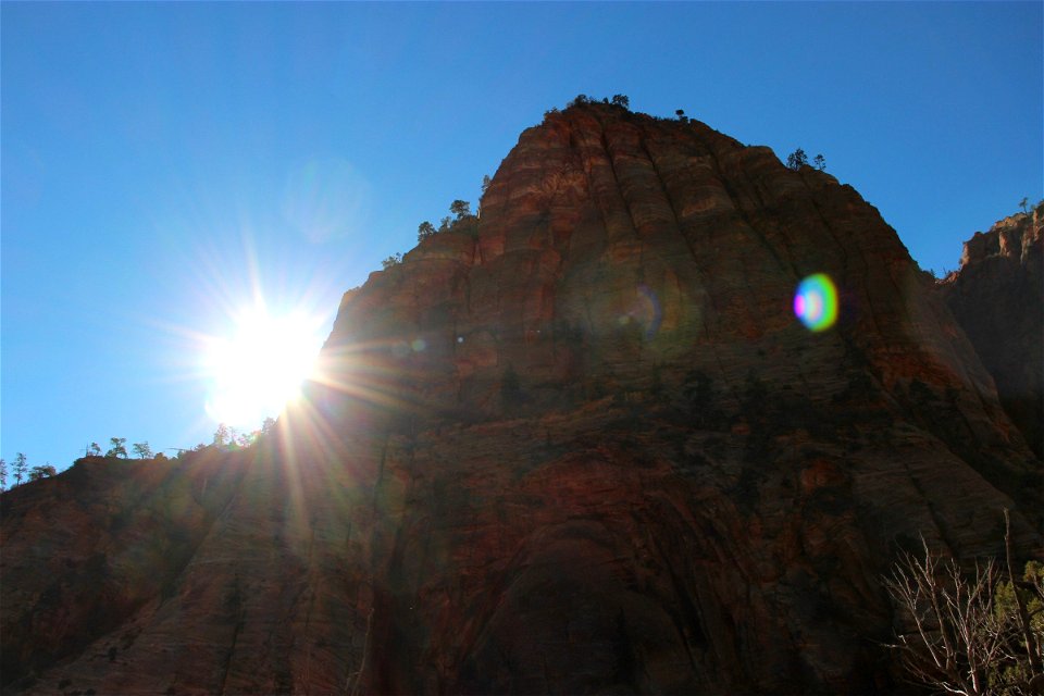 Sun Shining Next to Rock Mountain