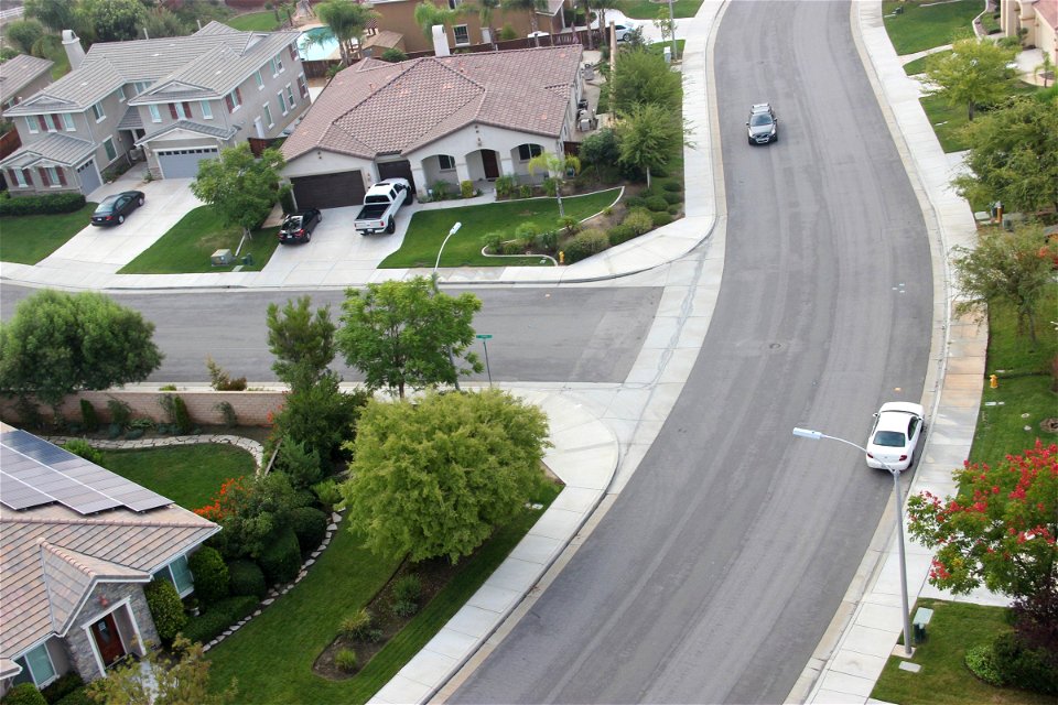 Cars on Curved Neighborhood Street