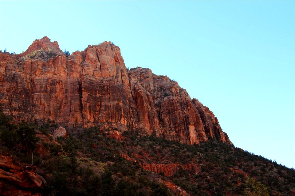 Rocky Mountain Cliffs On Blue Sky photo