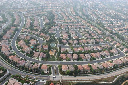 Aerial View of Houses & Streets in Suburbs photo