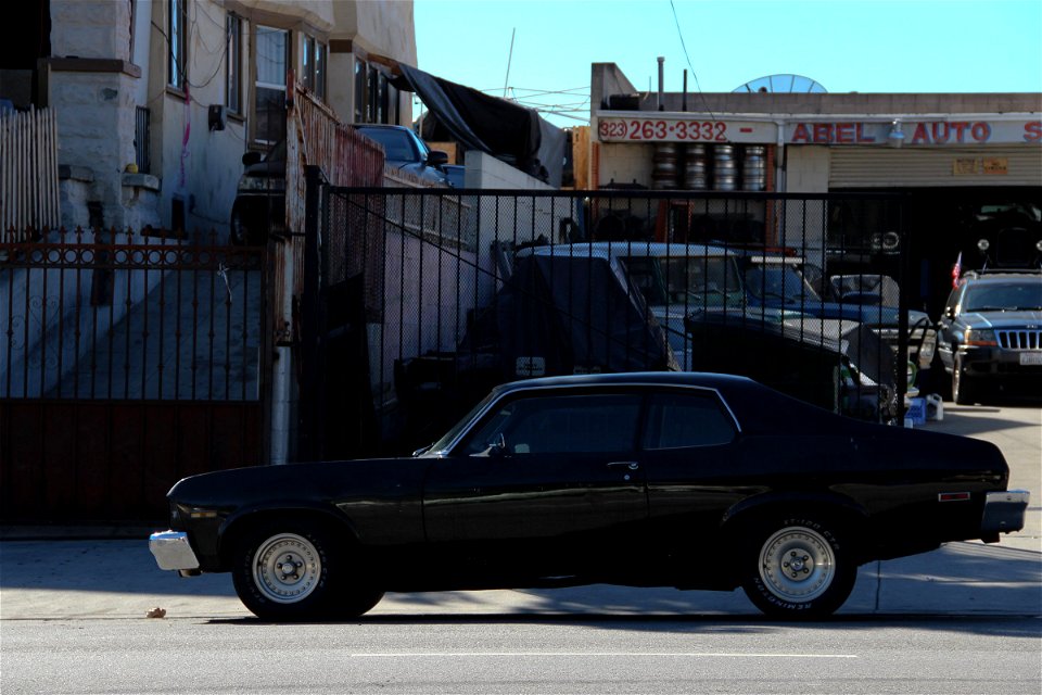 Black Classic Muscle Car on Street photo