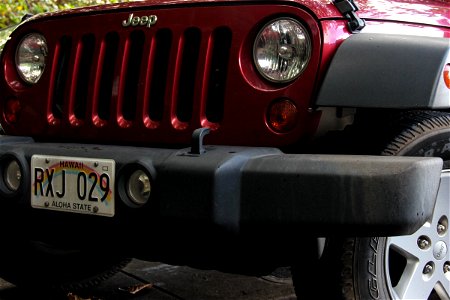 Front Grill of Red Jeep photo