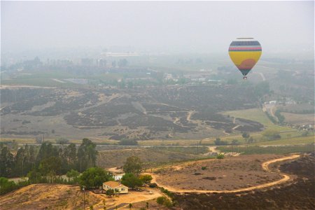 Hot Air Balloon Over Countryside photo