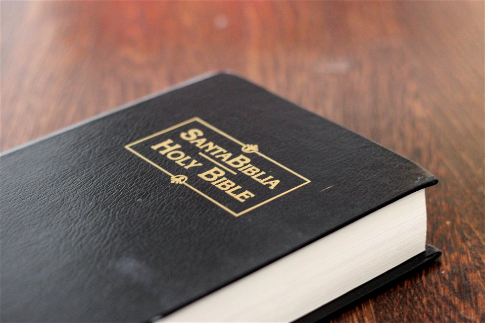 Black Spanish Bible on Table photo