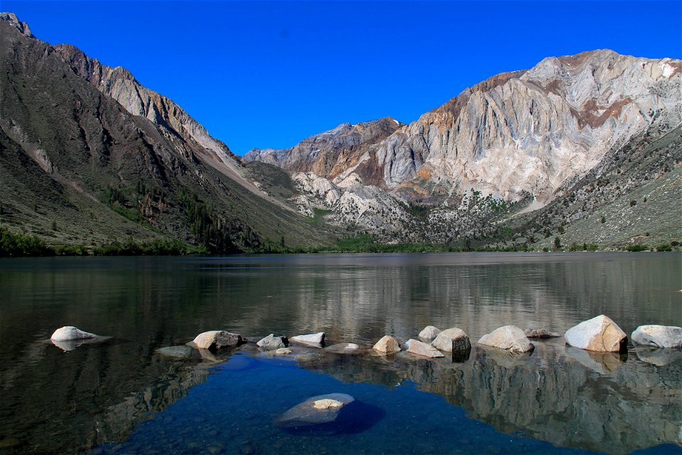 Mountains Behind Lake With Reflection photo