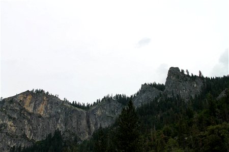 Rock Mountains Lined with Trees photo
