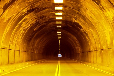 Tunnel with Bright Yellow Lights photo