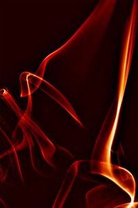 Red smoke swirl on black