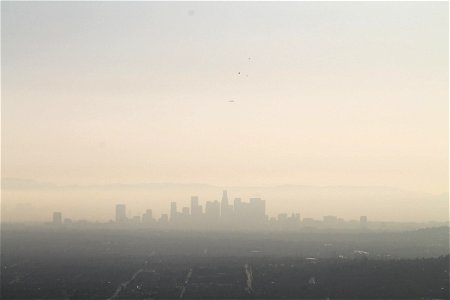 Distant Downtown City Buildings in Smog photo
