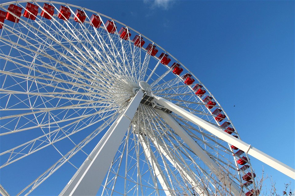 Large Red & White Ferris Wheel in Blue Sky