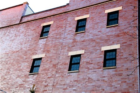 Red Brick Building with 6 Windows photo