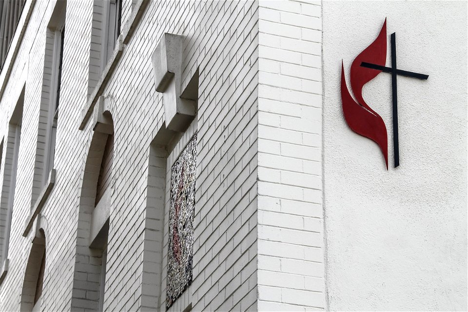Cross on White Brick Church Building