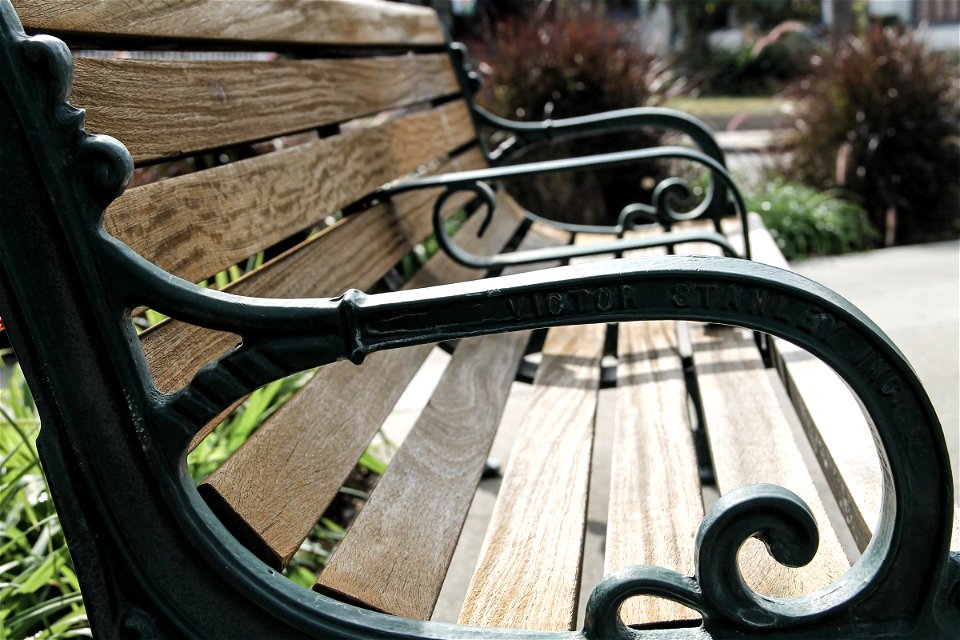 Side of a Park Bench Armrest