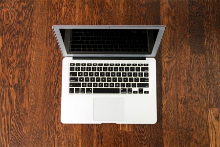 Open Macbook Air Laptop on Wood photo