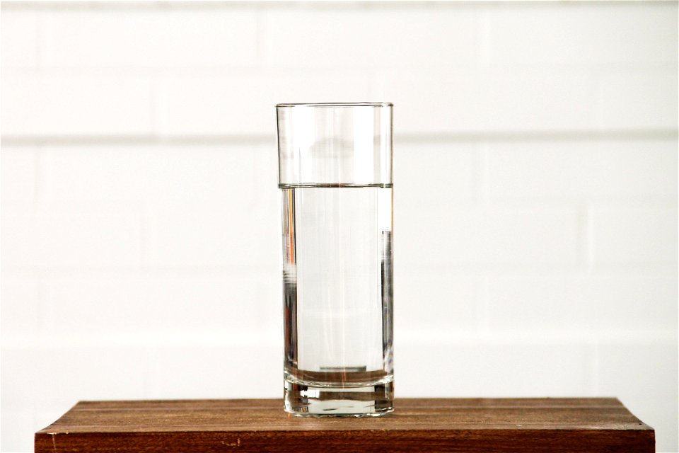 Glass of Clean Water on a Small Table