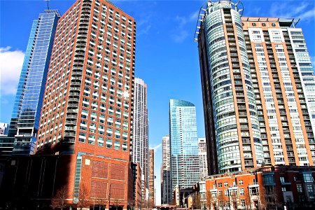 Tall Brick & Glass Buildings in City photo