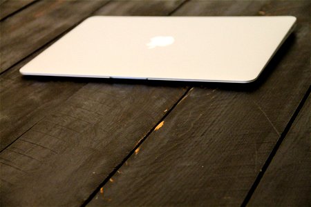 Macbook Air Laptop On Wood Boards photo