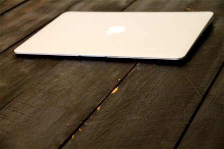 Macbook Air Laptop On Wood Boards