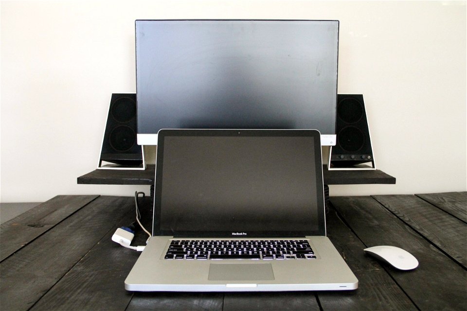 Laptop with Monitor & Speakers on Desk