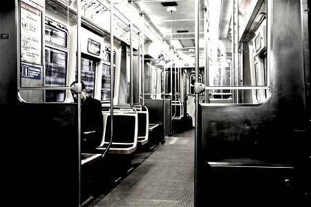 Man Sitting Alone in Empty Train photo