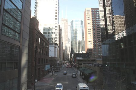 Street Between Tall Buildings in Downtown City photo