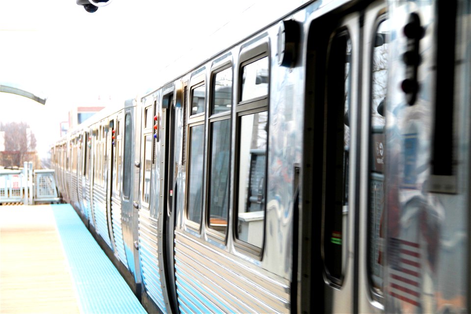 Side of Metro Rail Train Arriving at Station photo