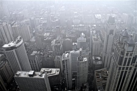Bird’s Eye View of Downtown City Skyscrapers Covered in Fog photo