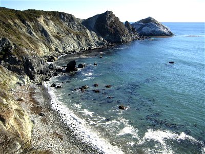 Cliffs Around Ocean Bay with Rocky Shore