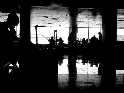 Silhouette of People at Airport Terminal photo