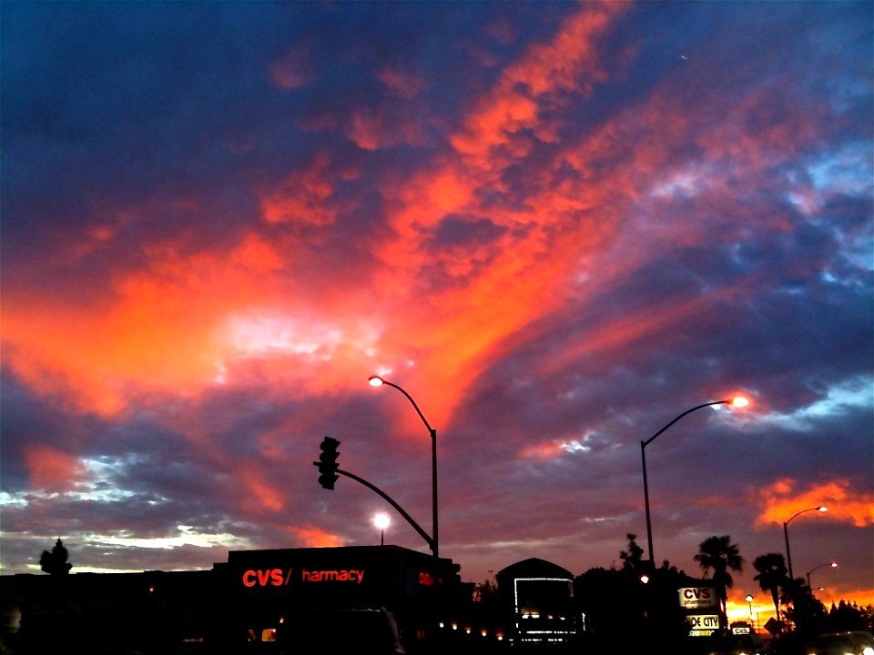 Silhouette of Street Lamps on Sunset Sky
