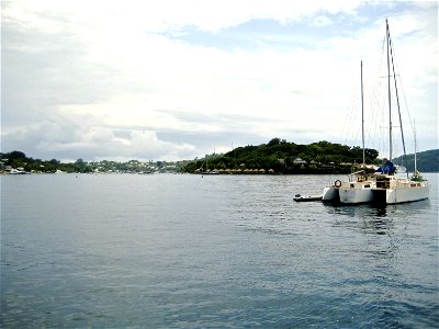 Yacht on Still Ocean Day photo