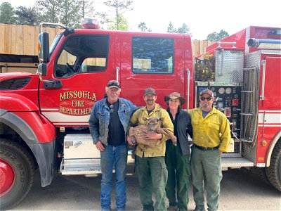 Firefighters with and Elk Calf, Hermit photo
