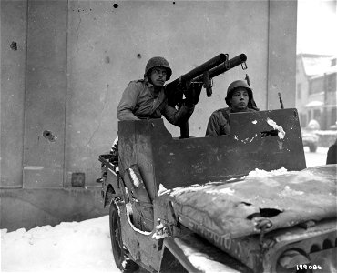 SC 199086 - Double trouble for the Germans comes in the form of twin bazookas mounted on a .50 caliber machine gun mount, which can be completely traversed. photo