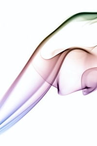 Colored smoke swirl on white