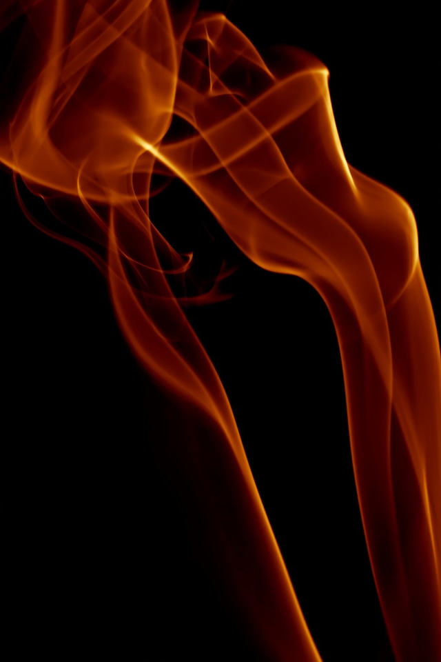 Swirly red smoke on black