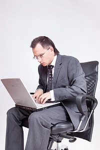 Businessman using computer photo