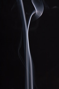 Smooth smoke on black background photo