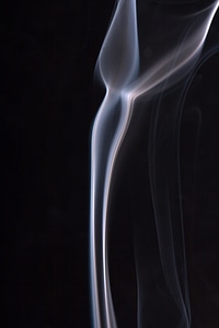 Blue smoke on black