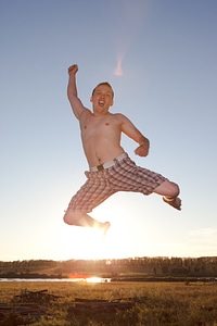 Young jumping man photo