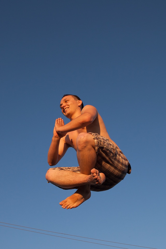 Young jumping man photo