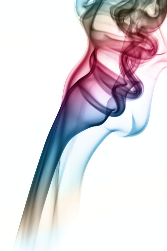 Deep colored smoke on white