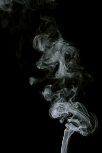 Gray smoke on black photo