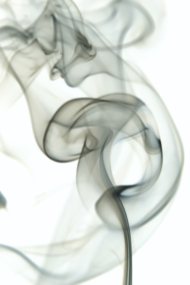 Black smoke on white background
